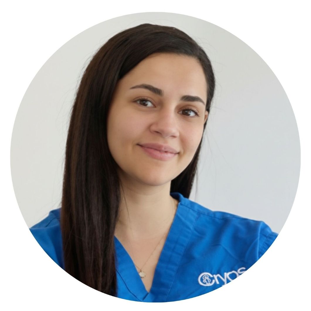 Cryos IVF Clinic 2 Afet Soykok MSc, Senior Clinical Embryologist at Cryos IVF Clinic in Nicosia, Cyprus. Professional portrait of fertility specialist in blue medical scrubs smiling for IVF clinic team page.