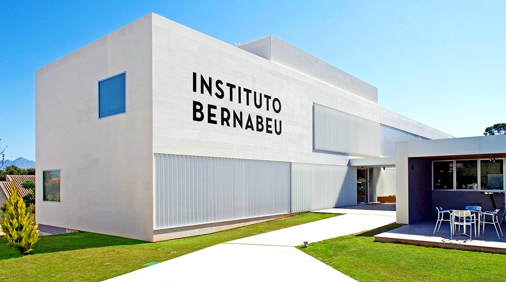 The article provides insights into IVF treatment at the renowned Instituto Bernabeu clinic. The image showcases the clinic's exterior.