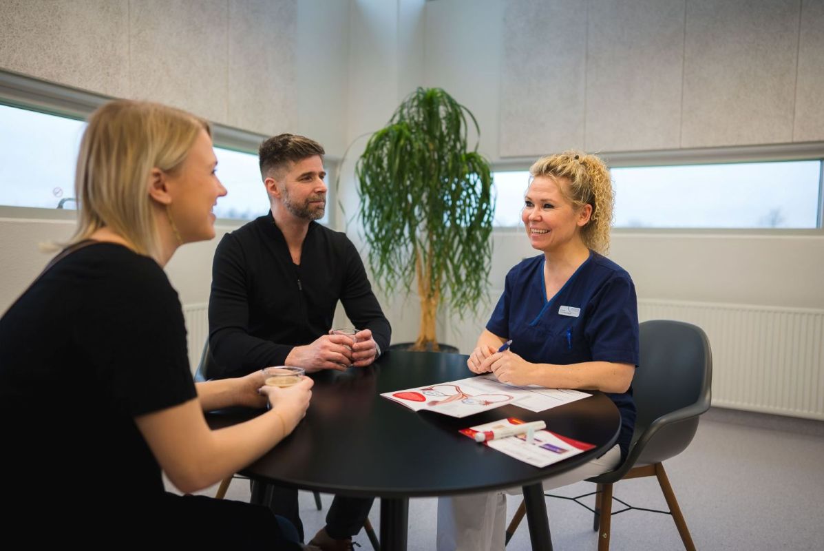 Freya Fertility 4 Fertility specialist consulting with couple at Freya Fertility clinic, providing expert guidance and treatment planning in modern consultation room.