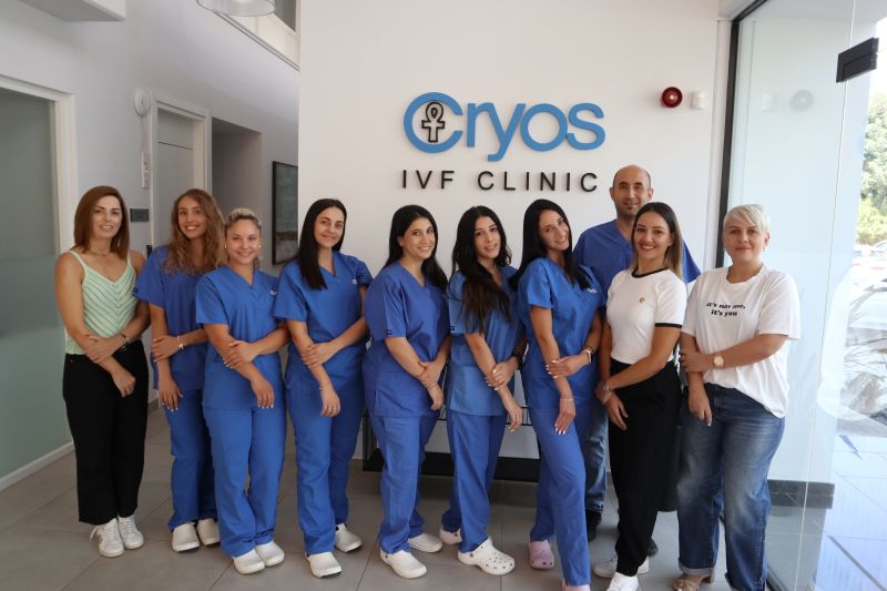 Cryos IVF Clinic 3 Team of medical and support staff at Cryos IVF Clinic in Cyprus, standing together in the clinic's lobby, showcasing a professional and welcoming environment.